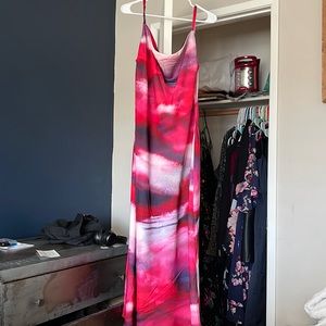 Took the tags off but never wore. Beautiful maxi dress